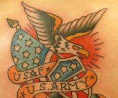 The eagle with a scroll to tribute the Air Force and the Army