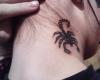 Perfect beware sign represented through a scorpion behind her ear