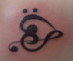 Popular design for small tattoos, it a music heart with treble clef symbol