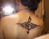 Another tasteful twist to treble clef symbol done by attaching to it the tribal wings