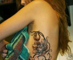 Tattoo de Flores y tribales