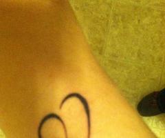Heart infinity arm tattoo