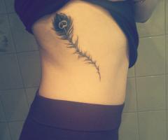 feather tattoo meaning for girls