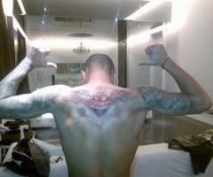 Heart and wings tattoo