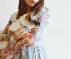 Cat feminine sleeve tattoo