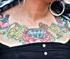 Diamonds and swallows on chest