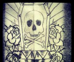 tiny coffin with skull and diamond