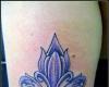 http://www.tattooset.com/images/tattoo/2012/09/29/10005-lily-flower-tattoo_tiny.jpg