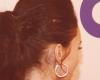 Megan Fox's neck theres a small black symbol for strength