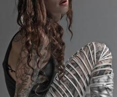 Kat Von D leg tattoos