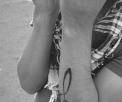 Tatuaje de clave de sol