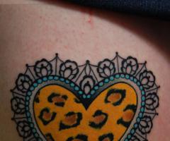 Cheeta leopard heart tattoo