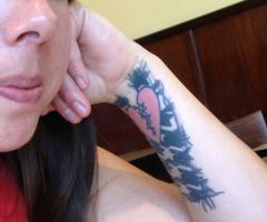Tattoo broken heart on arm