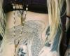 Kat Von D Rocking angel tattoo