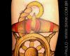 Tatuagem de âncora e leme