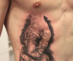 Catholic hands tattoo