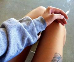 Feminine skull on leg