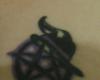 Pentagram with witches hat tattoo