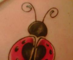 Lady bug tattoo