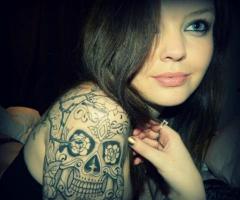 Girl with skull tattoo