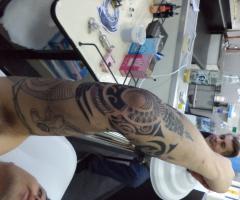 Arm tattoo maori style