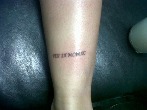 Tatuaje de numeros romanos
