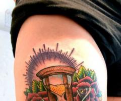 Hourglass tattoo meaning
