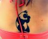 Panda tattoo on lower back