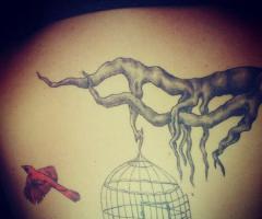 Flying bird tattoo meaning