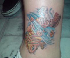 Koi fish ankle tattoo