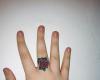 Ring of small rose tattoo