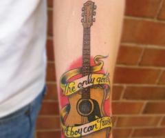 The Only Girl A Boy Can Trust Is His Guitar