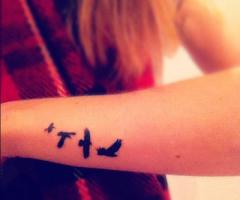Birds in flight tattoo
