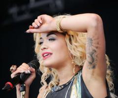 Rita Ora tattoo on left arm