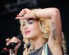 Rita Ora tattoo on left arm