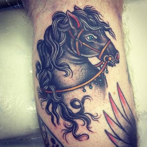 Sarah Carter horse tattoos