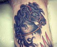 Sarah Carter horse tattoos