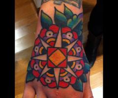 Steve Byrne hand tattoo