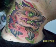 Diabolical dog neck tattoo