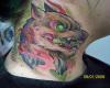 Diabolical dog neck tattoo