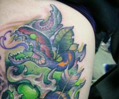 Tattoo skull and snake traditional art