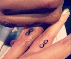 Matching infinity sign tattoo