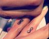 Matching infinity sign tattoo