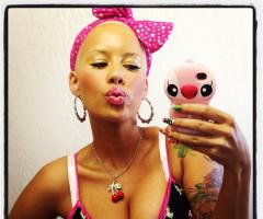 Amber Rose hand tattoo