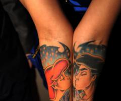 Ariel and Eric tattoo for couples