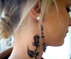 Rose tattoo for girl