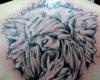 http://www.tattooset.com/images/tattoo/2012/11/16/12430-virgen-cuidando-a-bebe-con-nombre-nicolas-baltazar_tiny.jpg