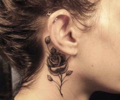 Rose neck tattoo