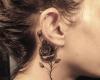 Rose neck tattoo