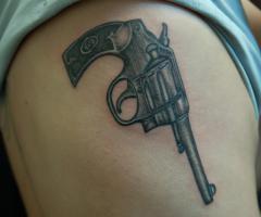 Gun tattoo for girls